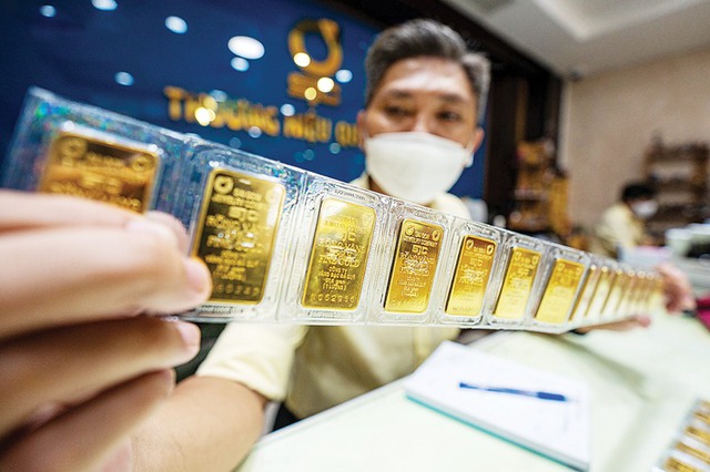 Thủ tướng: Khẩn trương thực hiện ngay các giải pháp ổn định thị trường vàng- Ảnh 1.